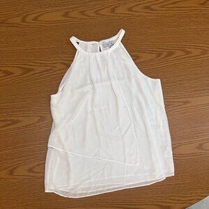 Elegant and feminine white sleeveless halter top by Naked Zebra